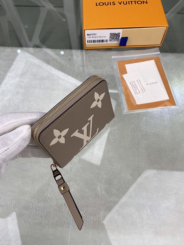 ミニウォレット ルイヴィトン 偽物 ジッピー財布 ベージュ モノグラム アンプラント M69797