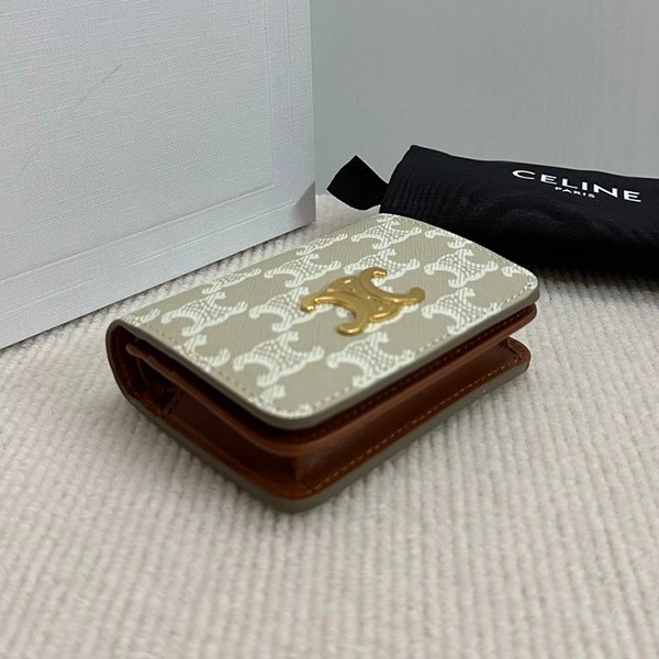 送料込 セリーヌ トリオンフキャンバスコンパクトウォレット 偽物 10K622CQH