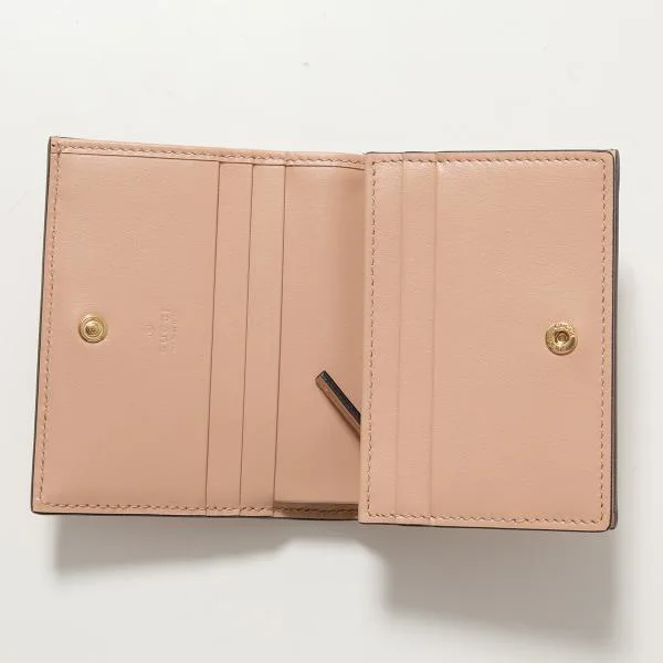 グッチ 二つ折り財布 偽物 723786 UM8IG GGマトラッセ