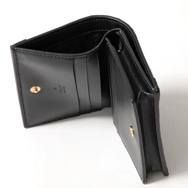 グッチ 二つ折り財布 偽物 723786 UM8IG GGマトラッセ